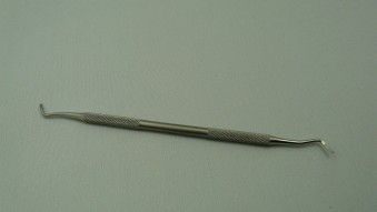 TOE NAIL CURETTE